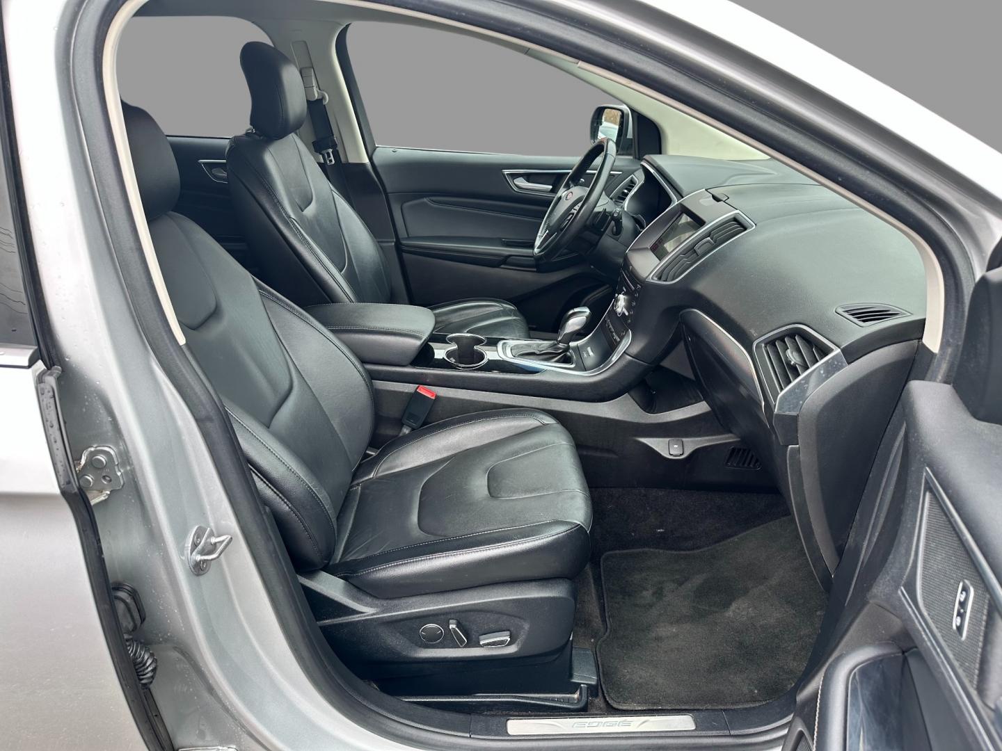 2017 Silver /Black Ford Edge Titanium (2FMPK4K92HB) with an 2.0L I4 DOHC 16V Turbo engine, 6-Speed Automatic transmission, located at 547 E. Main St., Orwell, OH, 44076, (440) 437-5893, 41.535435, -80.847855 - This 2017 Ford Edge Titanium AWD is a well-equipped midsize SUV. It comes with a powerful yet efficient 2.0L EcoBoost engine paired with a smooth 6-speed automatic transmission. Notable features include LED daytime running lights, dusk-sensing headlights, leather interior, auto-dimming rearview mirr - Photo#42